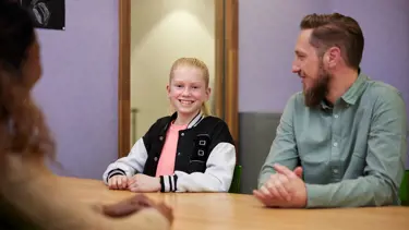 Cito volgsysteem VO - leerling en ouder in gesprek met docent Cito volgsysteem VO - leerling en ouder in gesprek met docent